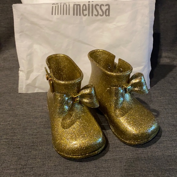 Mini Melissa gold glitter rain boots a size new with dust bag